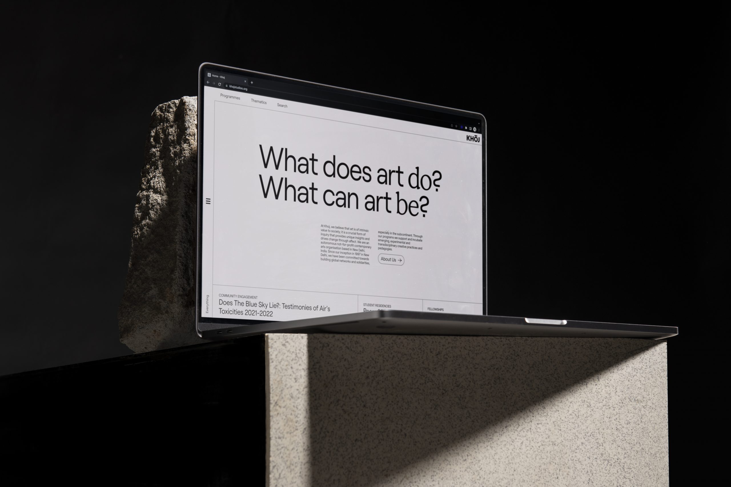 Laptop screen with redesigned art collective website