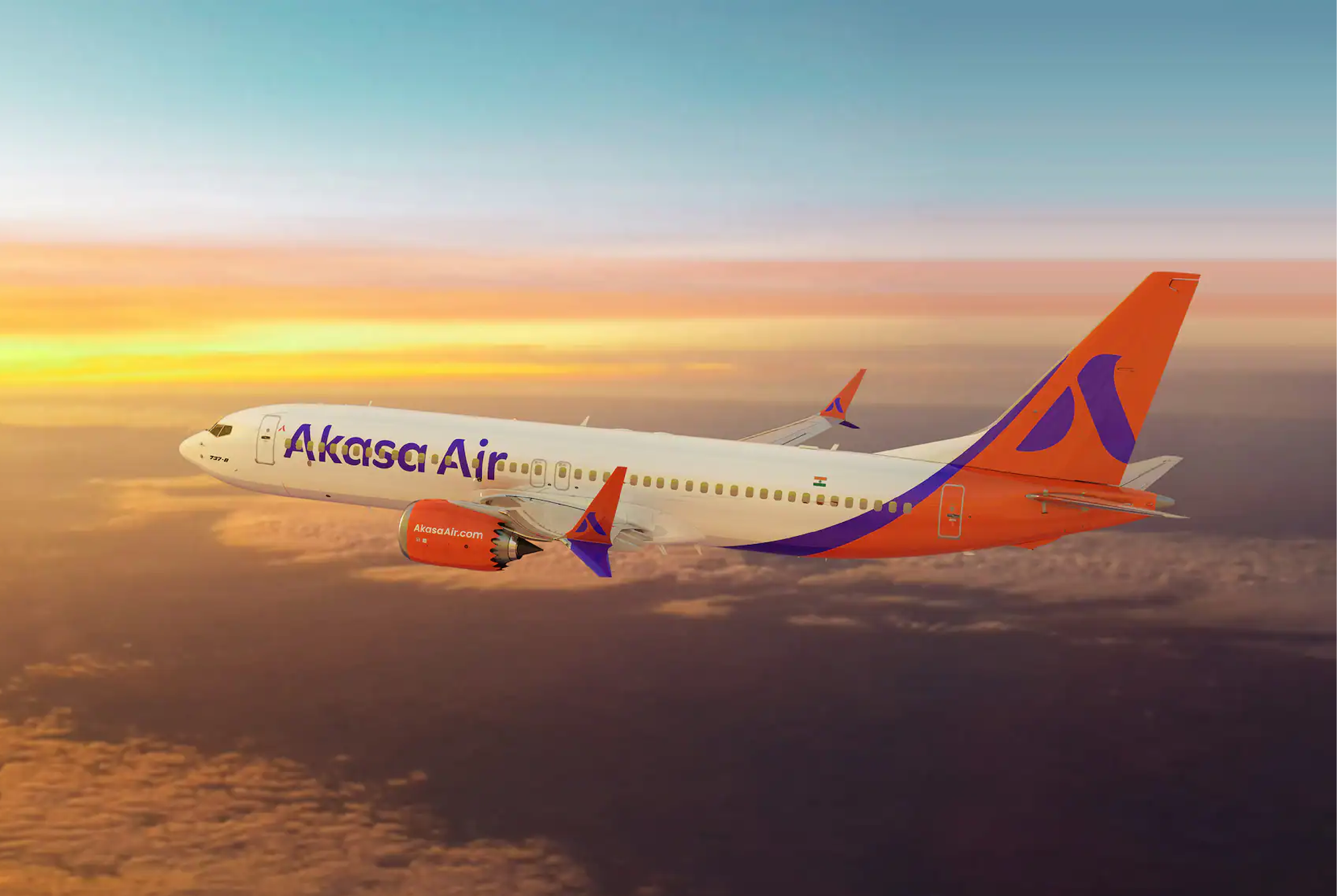 Akasa Air plane flying in sunset